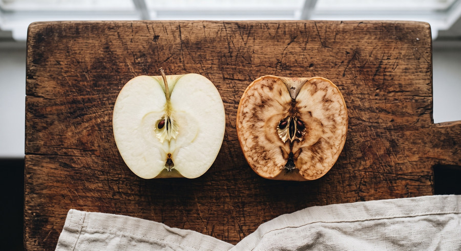 The cut half of an apple, going brown. The same reaction, happening inside you all day.